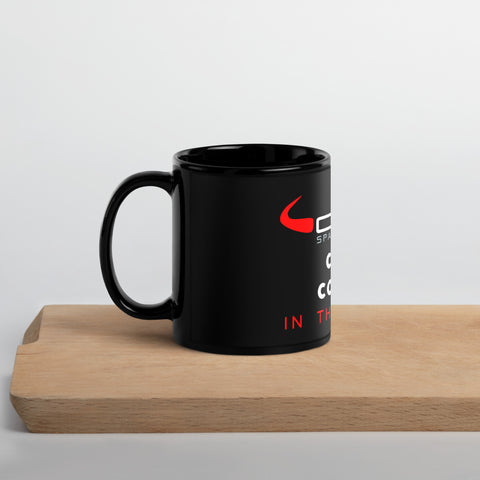 Taza negra con frase 'Con 2 Cojones in the Morning', diseño atrevido para amantes del café.
