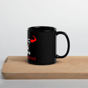 Taza negra con frase 'Con 2 Cojones in the Morning', diseño atrevido para amantes del café.